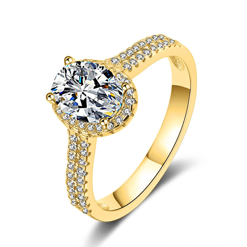 טבעת בציפוי זהב משובצת זירקונים - דגם סולו